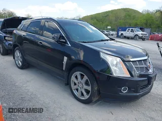 2012 Cadillac SRX Performance Collection with VIN 3GYFNEE32CS512118, listed as a IAAI auction lot 42158452 with 143,449 mi miles. Bid and sale history available at carsss.com. Image 1.