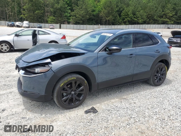 2023 Mazda CX-30 Premium with VIN 3MVDMBDY1PM509621, listed as a Copart auction lot 58316715 with 27,979 mi miles and Salvage title. Bid and sale history available at DreamBid. Image 1.