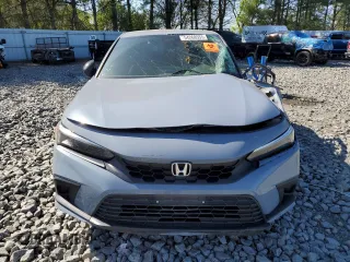 2023 Honda Civic Sport z VIN 19XFL2H85PE004313, wystawiony jako Copart lot #54268555 z przebiegiem Nie podano mil oraz Szkoda całkowita • Salvage title. Historia ofert i sprzedaży dostępna na DreamBid. Obrazek 5.
