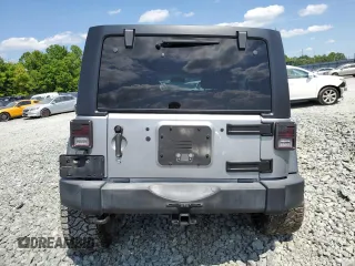 2016 Jeep Wrangler Unlimited Sport z VIN 1C4BJWDG1GL187340, wystawiony jako Copart lot #56011075 z przebiegiem 155 215 mil mil oraz Szkoda całkowita • Salvage title. Historia ofert i sprzedaży dostępna na DreamBid. Obrazek 6.