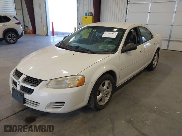 2006 Dodge Stratus SXT z VIN 1B3EL46X56N117417, wystawiony jako IAAI lot #41698342 z przebiegiem 86 944 mil mil oraz . Historia ofert i sprzedaży dostępna na DreamBid. Obrazek 2.