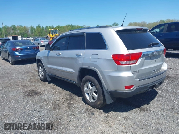 2011 Jeep Grand Cherokee 70th Anniversary with VIN 1J4RR4GG8BC515170, listed as a IAAI auction lot 42135654 with 208,638 mi miles. Bid and sale history available at carsss.com. Image 3.