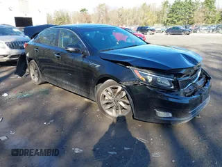 2014 Kia Optima SXL Turbo with VIN 5XXGR4A65EG297352, listed as a IAAI auction lot 42151539 with 112,496 mi miles and . Bid and sale history available at DreamBid. Image 1.