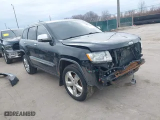 2012 Jeep Grand Cherokee Overland with VIN 1C4RJFCG3CC148601, listed as a IAAI auction lot 41717658 with 127,681 mi miles. Bid and sale history available at carsss.com. Image 1.