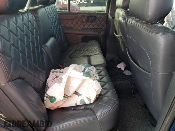 2000 GMC Jimmy Diamond Edition Luxury z VIN 1GKDT13W9Y2305564, wystawiony jako Copart lot #49488665 z przebiegiem 256 410 mil mil oraz Szkoda całkowita • Salvage title. Historia ofert i sprzedaży dostępna na DreamBid. Obrazek 12.