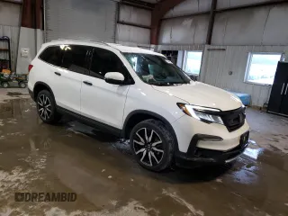 2019 Honda Pilot Touring 7-Passenger with VIN 5FNYF6H65KB049695, listed as a Copart auction lot 43444365 with 79,023 mi miles and Salvage Title. Bid and sale history available at DreamBid. Image 4.