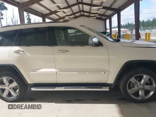 2011 Jeep Grand Cherokee Overland with VIN 1J4RR6GG0BC683624, listed as a IAAI auction lot 42729697 with 212,739 mi miles and . Bid and sale history available at DreamBid. Image 13.