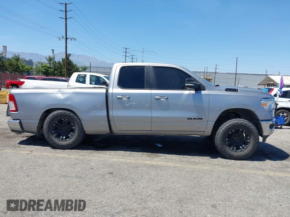 2021 Ram 1500 Big Horn with VIN 1C6SRFBT1MN622633, listed as a IAAI auction lot 42691343 with 122,007 mi miles and . Bid and sale history available at DreamBid. Image 13.