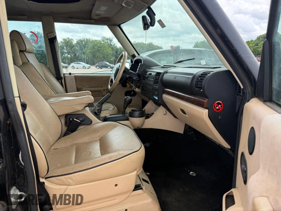 2003 Land Rover Discovery SE z VIN SALTW16443A810170, wystawiony jako Copart lot #61057015 z przebiegiem 149 678 mil mil oraz Czysty tytuł • Clean title. Historia ofert i sprzedaży dostępna na DreamBid. Obrazek 5.