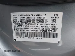 2007 Honda Odyssey EX-L with VIN 5FNRL38747B121059, listed as a IAAI auction lot 42211056 with 171,838 mi miles and . Bid and sale history available at DreamBid. Image 9.