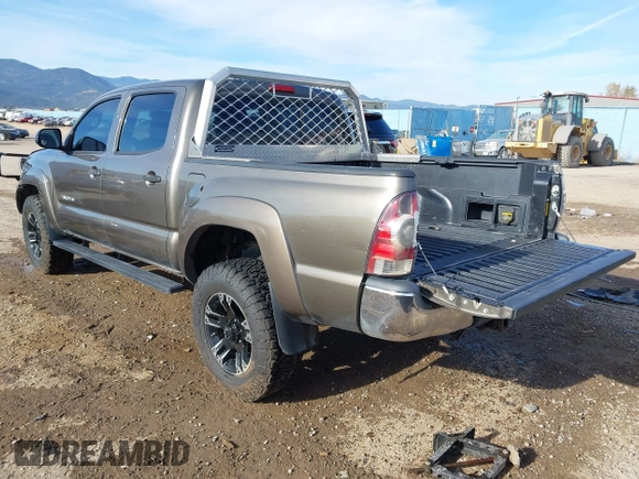 2014 Toyota Tacoma with VIN 3TMLU4EN3EM143882, listed as a IAAI auction lot 40657975 with 125,008 mi miles. Bid and sale history available at carsss.com. Image 3.