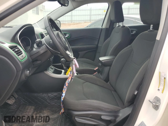 2018 Jeep Compass Sport z VIN 3C4NJCAB3JT123431, wystawiony jako Copart lot #63045144 z przebiegiem 118 849 mil mil oraz Szkoda całkowita • Salvage title. Historia ofert i sprzedaży dostępna na DreamBid. Obrazek 7.