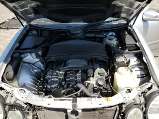 2000 Mercedes-Benz E with VIN WDBJF74J7YB055624, listed as a Copart auction lot 63880184 with 71,355 mi miles and Salvage Title. Bid and sale history available at DreamBid. Image 11.