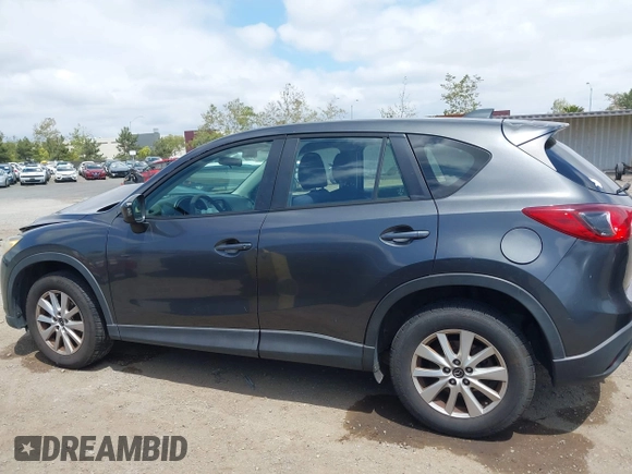 2014 Mazda CX-5 Sport with VIN JM3KE2BE0E0411377, listed as a IAAI auction lot 42143229 with 137,384 mi miles and . Bid and sale history available at carsss.com. Image 14.