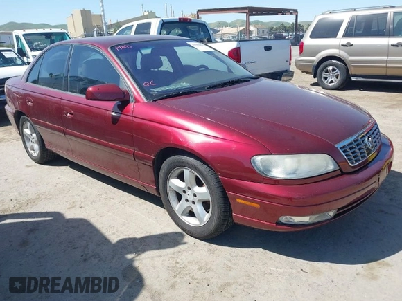 2001 Cadillac Catera z VIN W06VR54R01R003061, wystawiony jako IAAI lot #41989882 z przebiegiem 77 248 mil mil oraz . Historia ofert i sprzedaży dostępna na DreamBid. Obrazek 1.