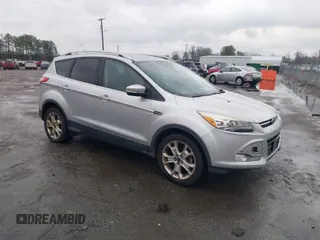 2016 Ford Escape Titanium with VIN 1FMCU0JX7GUB25573, listed as a IAAI auction lot 41871980 with 157,525 mi miles. Bid and sale history available at carsss.com. Image 1.