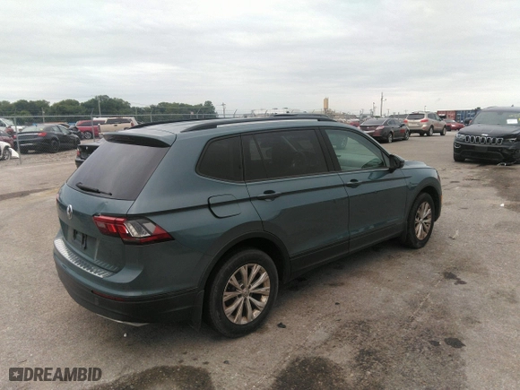 2019 Volkswagen Tiguan S with VIN 3VV1B7AXXKM121963, listed as a IAAI auction lot 40076115 with 167,540 mi miles. Bid and sale history available at carsss.com. Image 4.