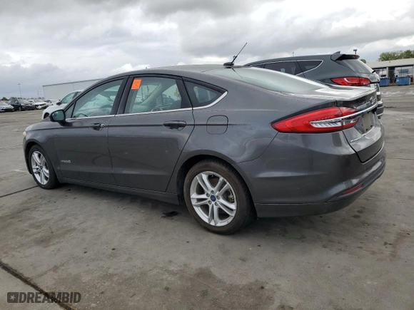 2018 Ford Fusion Hybrid SE with VIN 3FA6P0LU0JR140030, listed as a Copart auction lot 51165995 with 165,602 mi miles and Clean Title. Bid and sale history available at carsss.com. Image 2.