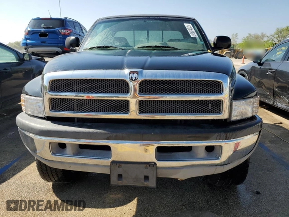 2001 Dodge 2500 z VIN 1B7KF23W71J542954, wystawiony jako Copart lot #55684025 z przebiegiem 172 811 mil mil oraz Szkody całkowita. Historia ofert i sprzedaży dostępna na DreamBid. Obrazek 5.