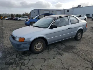 1996 Toyota Tercel DX z VIN JT2AC52L2T0137695, wystawiony jako Copart lot #86535844 z przebiegiem 246 554 mil mil oraz Tytuł czysty. Historia ofert i sprzedaży dostępna na DreamBid. Obrazek 1.