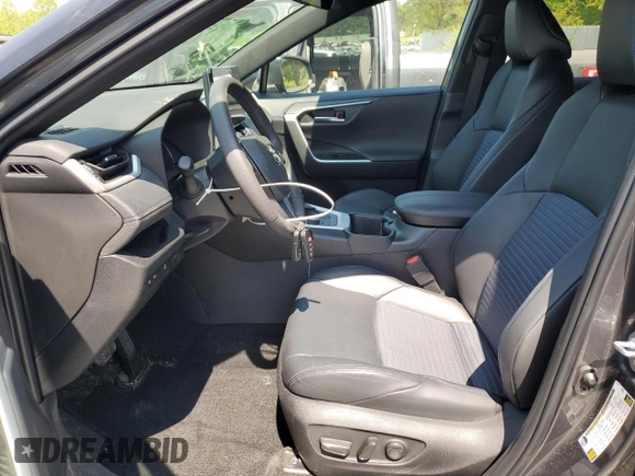 2024 Toyota RAV4 Hybrid XSE with VIN 2T3E6RFV7RW051046, listed as a Copart auction lot 53776205 with 21,589 mi miles and Salvage Title. Bid and sale history available at DreamBid. Image 7.