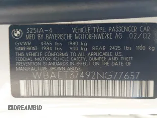2002 BMW 3 Series 325i with VIN WBAET37492NG77657, listed as a IAAI auction lot 41691705 with 163,700 mi miles. Bid and sale history available at carsss.com. Image 9.