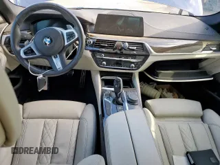 2020 BMW 5 Series M550i xDrive with VIN WBAJS7C09LCE06865, listed as a Copart auction lot 60140955 with Not provided miles and Salvage title. Bid and sale history available at DreamBid. Image 8.