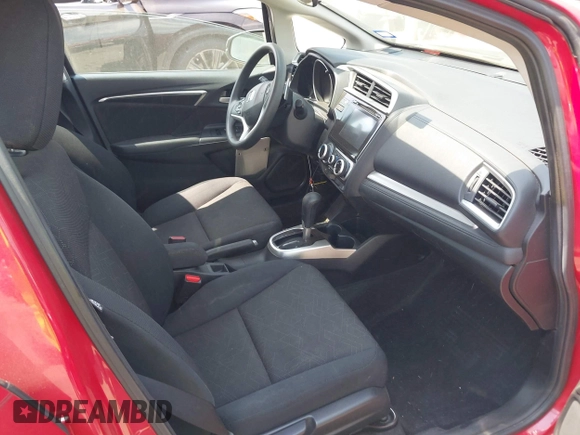 2015 Honda Fit EX-L z VIN 3HGGK5H86FM719146, wystawiony jako IAAI lot #42276633 z przebiegiem 155 515 mil mil oraz . Historia ofert i sprzedaży dostępna na DreamBid. Obrazek 5.