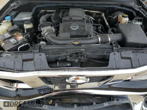 2011 Nissan Frontier Pro-4X with VIN 1N6AD0EVXBC433028, listed as a Copart auction lot 57653305 with 144,753 mi miles and Salvage title. Bid and sale history available at DreamBid. Image 11.