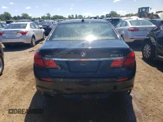 2014 BMW 7 Series ALPINA B7 xDrive with VIN WBAYF8C51ED653036, listed as a Copart auction lot 58156764 with 116,611 mi miles and Salvage Title. Bid and sale history available at DreamBid. Image 6.