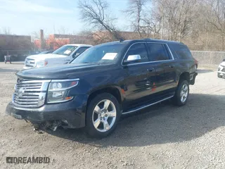 2015 Chevrolet Suburban LTZ with VIN 1GNSKKKC4FR635949, listed as a IAAI auction lot 41796028 with 172,818 mi miles. Bid and sale history available at carsss.com. Image 21.