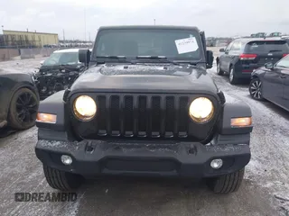 2023 Jeep Wrangler Sport S with VIN 1C4HJXDG8PW653828, listed as a IAAI auction lot 41239974 with 16,076 mi miles and . Bid and sale history available at DreamBid. Image 12.