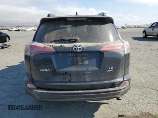 2017 Toyota RAV4 LE with VIN JTMBFREVXHJ146587, listed as a Copart auction lot 64794935 with 92,192 mi miles and Salvage title. Bid and sale history available at DreamBid. Image 6.