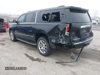 2017 GMC Yukon XL Denali with VIN 1GKS2HKJ2HR310377, listed as a IAAI auction lot 41153582 with 130,194 mi miles. Bid and sale history available at carsss.com. Image 3.
