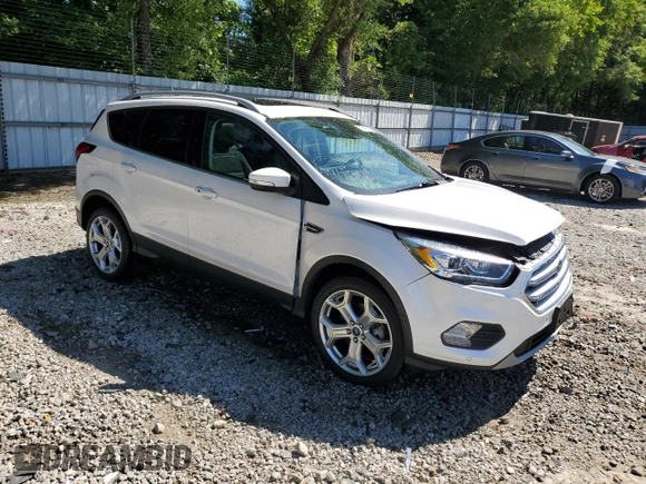 2019 Ford Escape Titanium with VIN 1FMCU9J97KUA21390, listed as a Copart auction lot 57640175 with 51,254 mi miles and Salvage title. Bid and sale history available at DreamBid. Image 4.