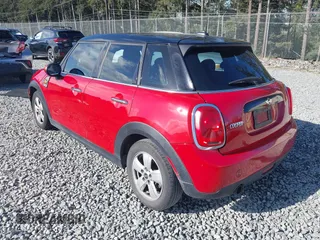 2015 MINI Hardtop 4 Door z VIN WMWXS5C59FT829635, wystawiony jako IAAI lot #42046985 z przebiegiem 171 731 mil mil oraz . Historia ofert i sprzedaży dostępna na DreamBid. Obrazek 3.