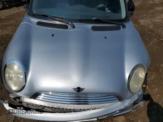 2004 MINI Hardtop with VIN WMWRC33454TJ56308, listed as a Copart auction lot 59690865 with 99,374 mi miles and Salvage title. Bid and sale history available at DreamBid. Image 11.