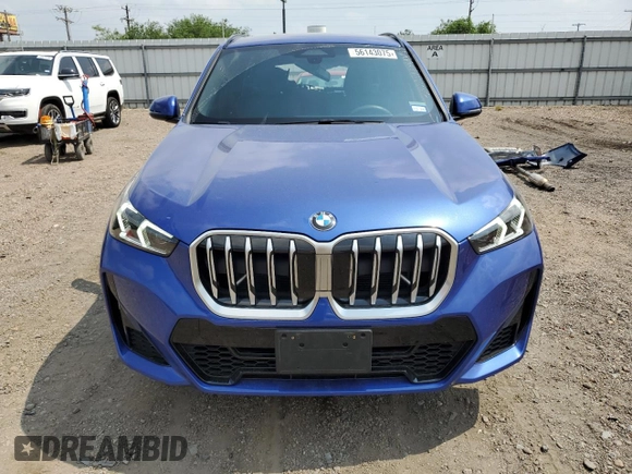 2024 BMW X1 xDrive28i with VIN WBX73EF06R5007063, listed as a Copart auction lot 56143075 with 2,947 mi miles and Salvage title. Bid and sale history available at DreamBid. Image 5.