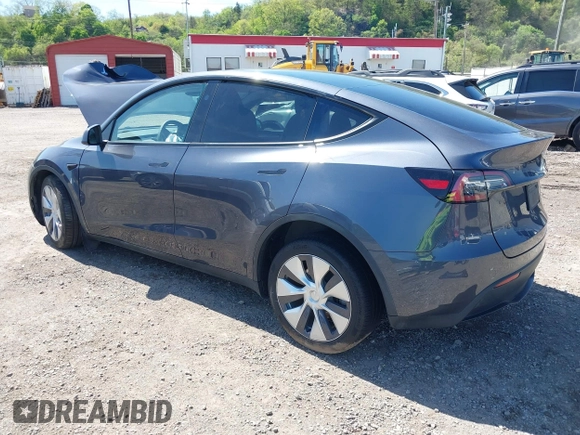 2023 Tesla Model Y Long Range z VIN 7SAYGDEE8PA191415, wystawiony jako IAAI lot #42155577 z przebiegiem 42 149 mil mil oraz . Historia ofert i sprzedaży dostępna na DreamBid. Obrazek 3.