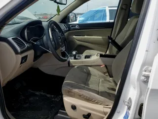 2014 Jeep Grand Cherokee Laredo with VIN 1C4RJFAG4EC119033, listed as a Copart auction lot 54064845 with 321,696 mi miles and Clean Title. Bid and sale history available at DreamBid. Image 7.