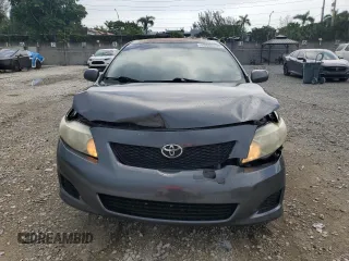 2010 Toyota Corolla with VIN 1NXBU4EE2AZ352883, listed as a Copart auction lot 63660205 with 131,039 mi miles and Salvage title. Bid and sale history available at DreamBid. Image 5.
