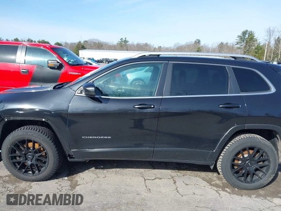 2015 Jeep Cherokee Limited with VIN 1C4PJMDS9FW710969, listed as a IAAI auction lot 41898698 with 144,789 mi miles. Bid and sale history available at carsss.com. Image 14.