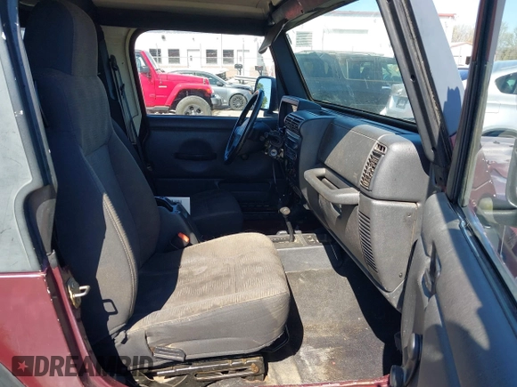 2003 Jeep Wrangler Sport with VIN 1J4FA49S33P345192, listed as a IAAI auction lot 41801344 with 196,472 mi miles. Bid and sale history available at carsss.com. Image 5.