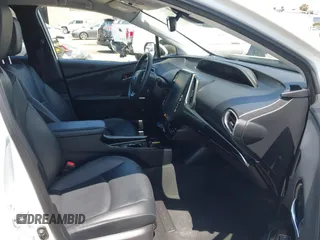 2021 Toyota Prius LE z VIN JTDKAMFP3M3187644, wystawiony jako IAAI lot #42443171 z przebiegiem 126 977 mil mil oraz . Historia ofert i sprzedaży dostępna na DreamBid. Obrazek 5.