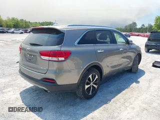 2018 Kia Sorento EX z VIN 5XYPH4A57JG410055, wystawiony jako IAAI lot #42023771 z przebiegiem 53 984 mil mil oraz . Historia ofert i sprzedaży dostępna na DreamBid. Obrazek 4.