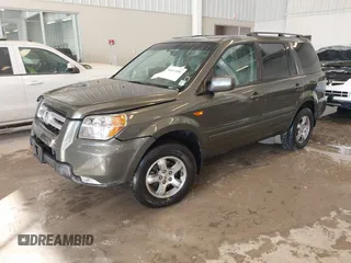 2006 Honda Pilot EX-L with VIN 5FNYF187X6B026463, listed as a IAAI auction lot 41612181 with 242,828 mi miles and . Bid and sale history available at DreamBid. Image 18.