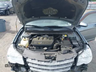 2007 Chrysler Sebring Touring z VIN 1C3LC56KX7N542931, wystawiony jako IAAI lot #42167913 z przebiegiem 240 638 mil mil oraz . Historia ofert i sprzedaży dostępna na DreamBid. Obrazek 10.
