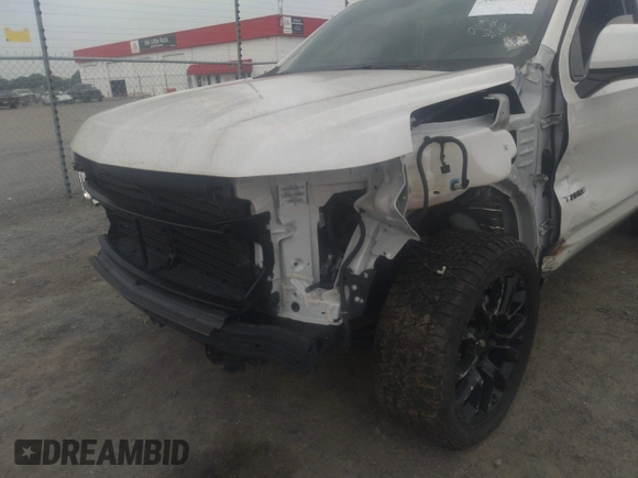 2022 Chevrolet Tahoe LT with VIN 1GNSKNKD5NR143276, listed as a IAAI auction lot 42268541 with 54,463 mi miles and . Bid and sale history available at DreamBid. Image 6.