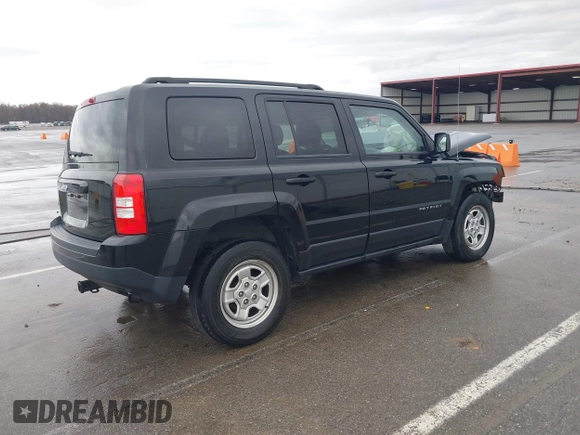 2014 Jeep Patriot Sport with VIN 1C4NJRBBXED879285, listed as a IAAI auction lot 41944152 with 103,676 mi miles. Bid and sale history available at carsss.com. Image 4.