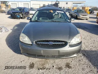 2002 Ford Taurus z VIN 1FAHP59S82A188995, wystawiony jako Copart lot #82141704 z przebiegiem 89 153 mil mil oraz Szkody całkowita. Historia ofert i sprzedaży dostępna na DreamBid. Obrazek 5.